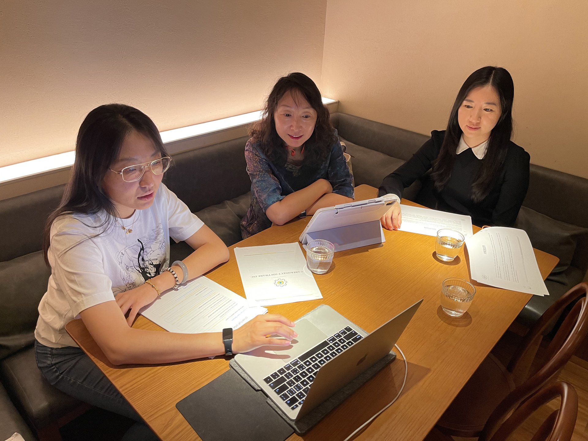 CareKonect founders reviewing priorities during the Beijing strategy meeting